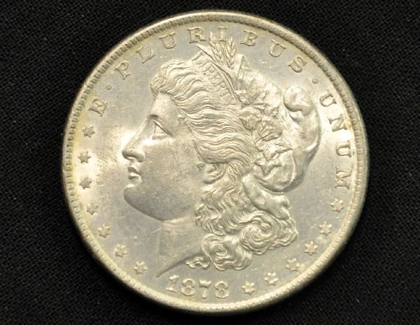 Nice 1878 Morgan Dollar Variation: AU with 8 tail feathers version. Grades are our opinion so examine photos or call for more information (203) 730-1404