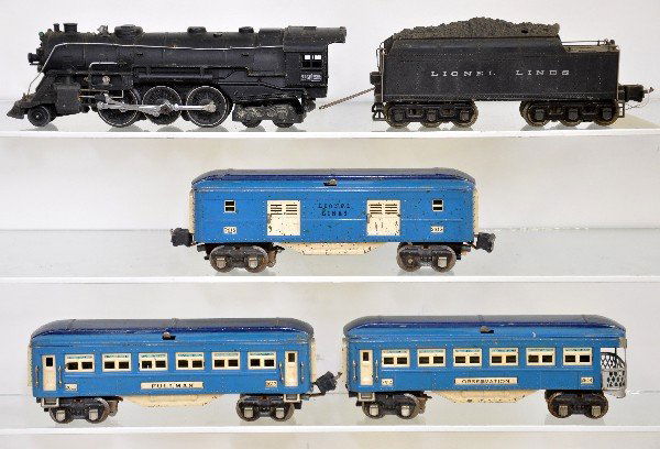 5 Pc Lionel 226E Blue Comet Set: 226E Hudson loco; 2226W tender, silver lettering; 2615 baggage; 2613 Pullman; 2614 observation, missing roof latch bracket on body. All show moderate playwear, otherwise C6-