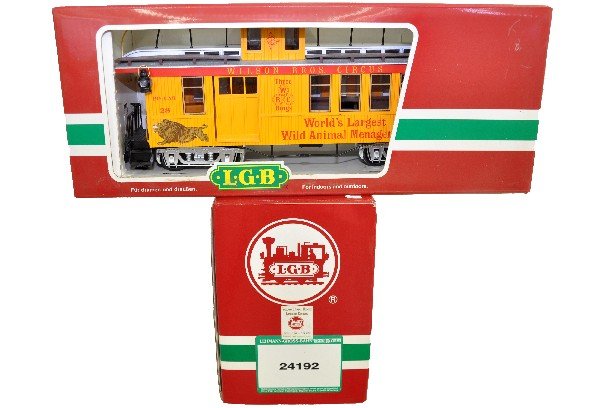 Boxed LGB 24192 Circus Mogul & Caboose: G Gauge. Wilson Bros. Circus 2-6-0 Mogul with sounds, 1 broken handrail stanchion; 4075-DG Circus Caboose, both are dusty and show light playwear, otherwise C7+-8