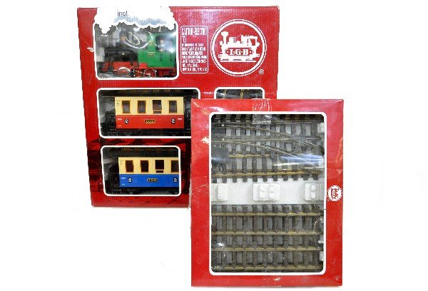 LGB 23301US Passenger Set, Plus: G Gauge. 3pc set with 0-4-0 loco & two coaches, track & transformer, set box; Plus 19902 extension track set with box. All lightly run, C8+-9