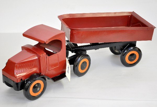 Restored Master Metals C-Cab Mack Truck: Pressed tin construction, 23" long with tipper dump rear trailer. Very unusual piece, old restoration.