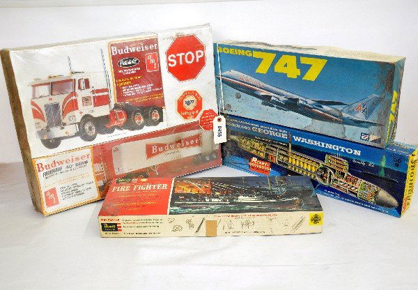 4 Vintage Model Kits: MPC 1:144 American Boeing 747; Renwal 1:500 George Washington nuclear submarine; Revell 1:64 Fire Boat, dated 1962; AMT 1:25 Budweiser Peterbuilt Truck & Trailer, factory sealed. All appear unbuilt wi