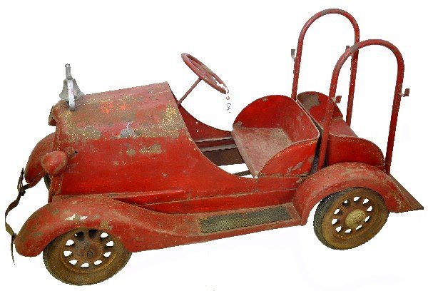 Scarce 1932 American National Fire Pedal Car: This scarce pedal car has great charm. 54" long, pressed steel. This model has a nice fendered 1930s design with its original lights & bell. It has a rear facing back seat with rubber covered running 
