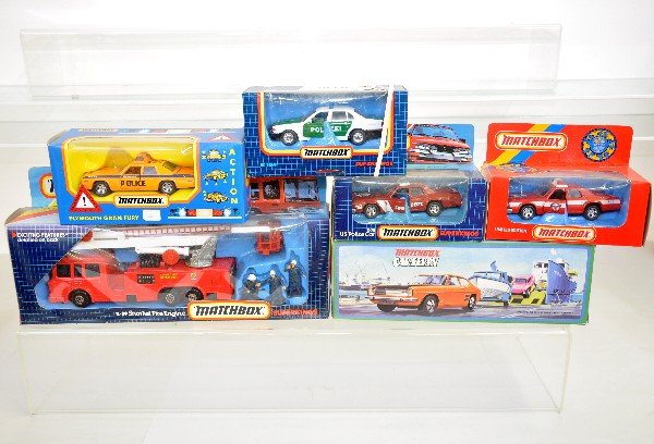 6 Boxed Matchbox King Size Vehicles: K39 Snorkel Fire Engine; 2 different K78 Fire Chief's Car; EM1 Police Car; K154 BMW Police Car; Scarce G7 Car-Ferry. All are like new in dusty boxes, C10