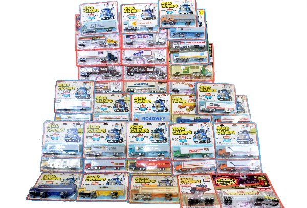 38 Road Champs Trucks: 75% are early models with 25% later, all are sealed on dusty cards, C10