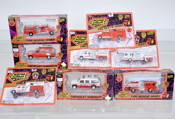 8 Road Champs 1:64 Fire Trucks: Unusual size for road champs, these 1995 issue pieces are nicely detailed and sealed or mint in dusty packaging, C10