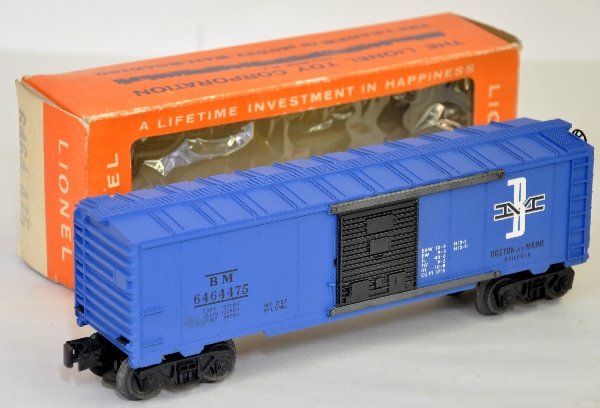 Scarce Dark Blue Lionel 6464-475 Boxcar: Tough variation of the type II B&M boxcars. Painted darker blue. It unrun with C7 cellophane window box, Car is C9+