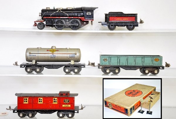 Boxed Lionel Jr Set 1062: This is the deluxe set that included an accessory set. 1681 loco, missing 1 pick-up clip; 1661T tender; 1677 gondola; 1680 tank car; 1682 caboose, transformer & track with 4 #1751 telegraph poles & 15