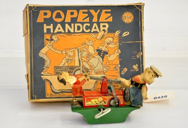 Scarce Marx Popeye & Olive Oyl Handcar: Litho tin w/rubber figures, clockwork functional, figures misshapen from drying, but better than most, track, scarce ob with nice graphics, o/w C7 tough!