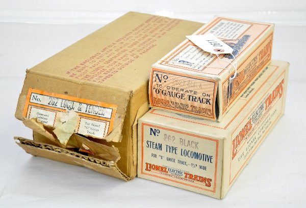 Fantastic Empty Lionel 262 Loco Boxes: Clean & complete 262 & 262T boxes with loco insert, plus the scarce master carton. There are NO trains in this lot! Examine photos or call for more information, (203) 730-1404.
