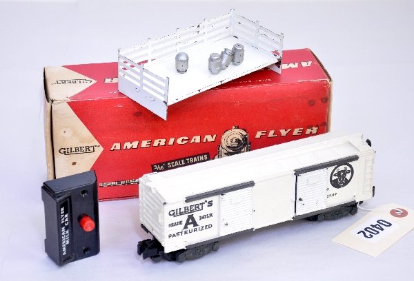 Boxed American Flyer 24019 Milk Car: Nice lettering and fairly clean. Includes a C6 platform, 4 cans & controller. Shows light playwear with ob & insert, C7+