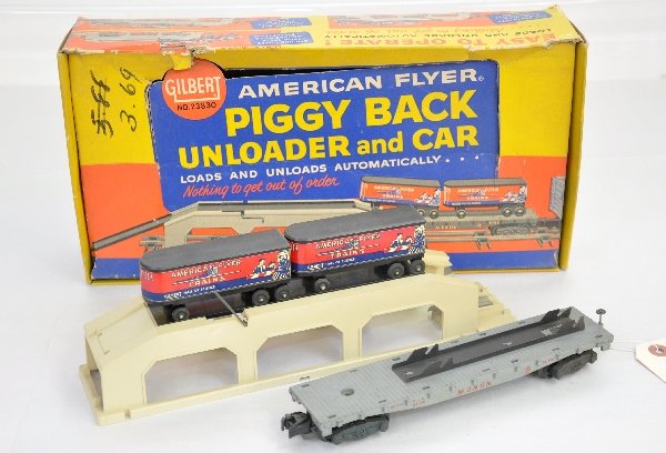 Boxed American Flyer 23830 Piggy back Set: S Gauge. Fairly clean & complete with unloader station. Has its original box without insert, C7