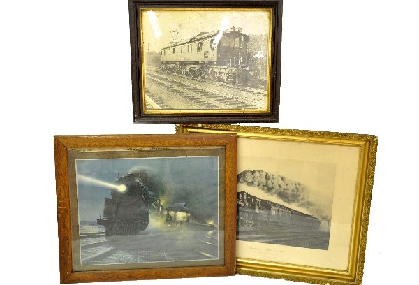 3 Railroad Framed Station Pieces: 23 X 19 framed photo of a NYNH&H P-2 #3003; 29 1/2 X 25" 1923 calendar top with original oak frame; 32 X 26" 1891 Photogravure of 20th Century Limited, by A.R. Yates. All are original pieces with peri