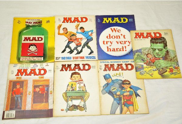 Collection Of 60+ Vintage MAD Magazines: Most from 1964 through 1980 including many desirable issues like the spoof on Aurora Monster Model Kits, Batman, Star Trek Movie and others, plus a original MAD newspaper comic clipping. Examine photo