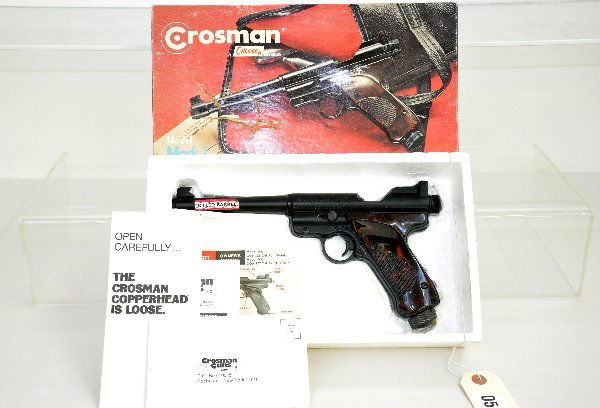 Boxed Crossman Mark I Air Pistol: All these lots are from a single owner collection. .22 cal single shot pellet pneumatic target pistol. Shows light signs of use & age with its original box & worn insert with paperwork. No guarantee o