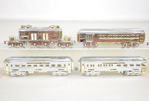 MTH American Flyer Mayflower Set: ST. GA. Includes 10-1217-1E loco, w/sound, w/cars 10-1217A, B & C. All show signs of handling with a few very minute spots on two roofs. Over-all shows light to moderate playwear, C7+-8