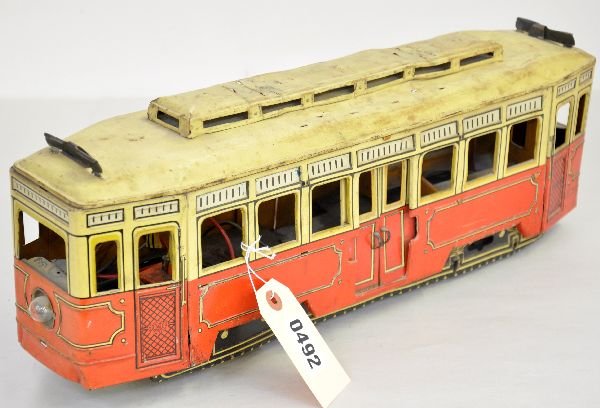 Customized Gunthermann Street Car: ST. GA. Originally from Lou Redman's collection. 19" litho tin floor toy, converted to run on standard gauge track. It is missing some top trim, as photographed, but happens to be a scarce German piec
