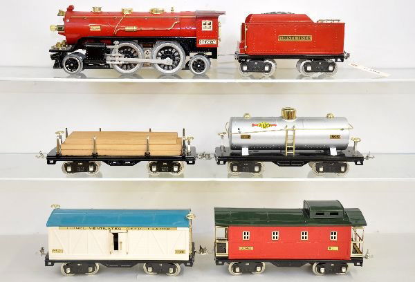 MTH Lionel 390E Freight Set: ST. GA. Red 2-390E loco & tender with whistle; 500 series tank car, reefer, lumber car & caboose. All appear lightly run, C8+