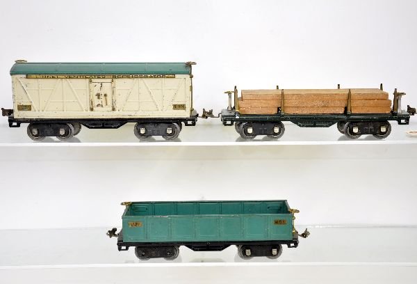 3 Lionel 500 Series Freight Cars: ST. GA. 511 lumber; 514 Reefer; 512 gondola, all show moderate playwear, C6