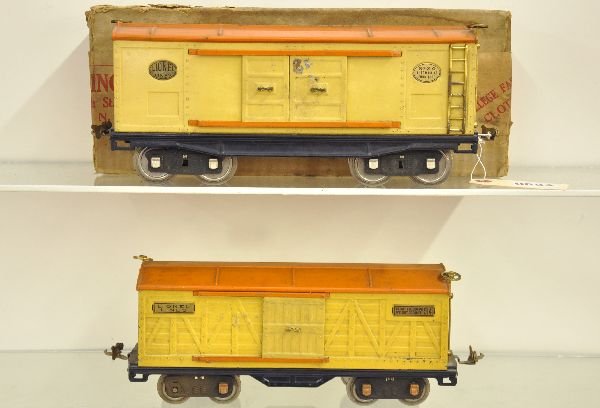 2 Lionel Boxcars: Original owner lot. ST. GA. 514 boxcar missing 1 journal box, dirty, C7; 214 boxcar, 1 door and catwalk edge shows some wear with box, both should otherwise clean to C6
