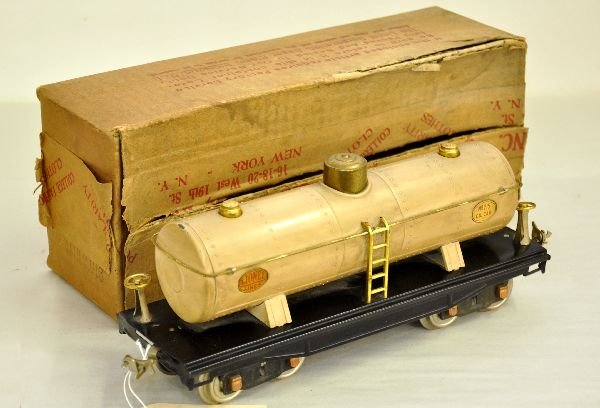 Nice Boxed Lionel Ivory 215 Tank Car: Original owner lot. ST. GA. 1934 production only without decal. It needs a cleaning, but only shows light to moderate playwear with box. Should clean to C7