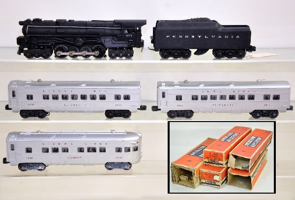 5 Pc Boxed Lionel Train Set: 671 steam turbine, missing rear steps; 2671W PRR tender, minor melt spot on bottom edge, ding on front corner; 2 #2635 Elizabeth Pullmans; 2636 Summit observation. All are otherwise clean showing ligh