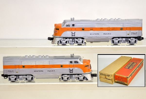 Boxed Lionel 2345 WP F3 AA Diesels: Nice double motor diesels with nice silver. They have minor decal cracks at doors, but much better than most. They show light run time with boxes, trailer has a loose flap, C7+ Nice.