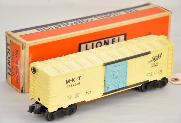 Boxed Lionel Girls Set, Part 5: This lot contains the 6464-515 MKT boxcar for the Sears Girl's set. It is a type IIB with a nice box and shows light playwear, C7+