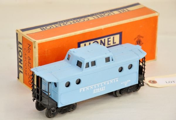 Boxed Lionel Girls Set, Part 6: This lot contains the 6427-500 PRR N5c Caboose for the Sears Girl's set. It is intact with a nice box and shows light playwear, C7+