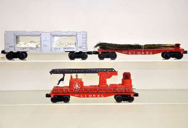 3 Late Lionel Freight Cars: 6826 flat with Christmas trees, original load with band; 3512 fire ladder car, missing 1 nozzle; 6445 Fort Knox Car, all show light playwear, C7+
