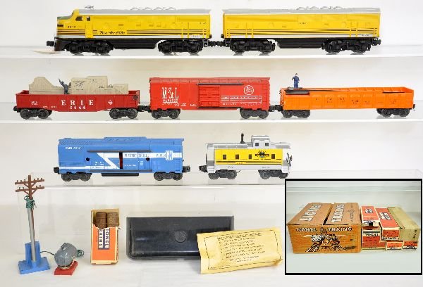 Nice Boxed Lionel Set 2291W: 1957. This set includes a clean 2379 RG F3 AB diesels. They have bright silver, super nose decal & clean battery box; 3444 cop & hobo car; 6464-525 M&StL boxcar, type IIB; 3652-75 barrel car, complete