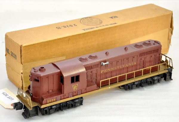 Nice Boxed Lionel 2028 PRR GP-7 Diesel: Clean with very nice gold rubber stamped lettering, much better than most. It shows light run time with a nice box, C7+-8