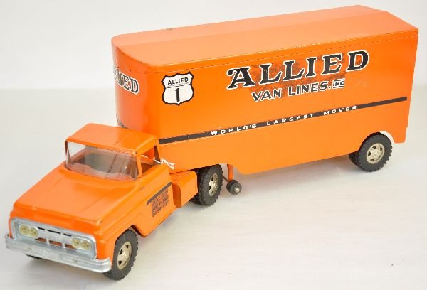 1960 Tonka Allied Van Lines Truck: Pressed steel, 24" long. Dark orange with new cab style. Clean, but some rust behind decals as usual. Should polish up nicely, showing light playwear. Otherwise C7+