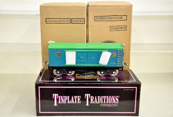3 MTH 200 Series Freight Cars: Standard Gauge. 10-2064 LV boxcar; 10-2187 Esslingers Beer car; 10-2039 Blue boxcar. All are unrun, 2 are sealed in their shippers, C9+-10