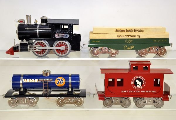 4 Pc McCoy Steam Freight Set: Standard Gauge. Little Chief steam tank loco; lumber car; tank car & caboose, cars have boxes and all show light playwear, C8-9