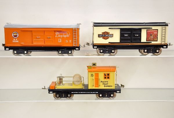 3 MTH 200 Series Freight Cars: Standard Gauge. Includes TCA PFE work caboose; Harley Davidson boxcar & SP boxcar. They show light run time, C8