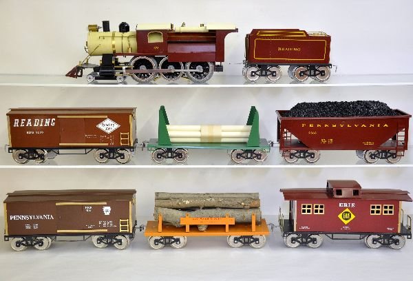Boxed 8Pc CMT Steam Freight Set: Standard Gauge. By Charlie Wood with some unusual cars. Includes a 675 Reading camel back loco & tender; 6005 log car; 2868 hopper; 4009 culvert pipe; 4108 boxcar; 4103 boxcar & 4503 caboose. All show