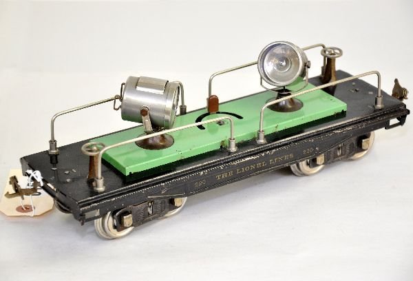 Late Lionel 220 Searchlight Car: Standard Gauge. Clean & complete with nickel trim. It shows moderate playwear, C6