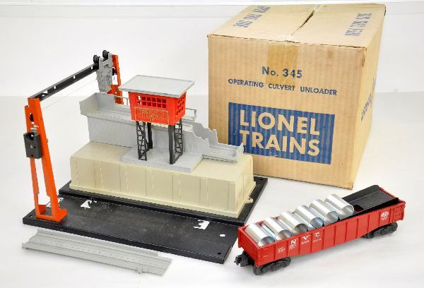 Boxed Lionel 345 Culvert Unloader: Clean, save for a small bit of gravel glued to track panel. Has its 6342 gondola with 6 culvert pipes, original box with insert. It shows light to moderate playwear, otherwise C7