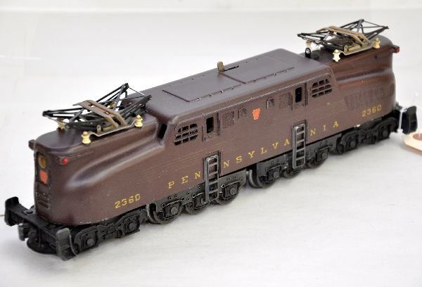 Lionel 2360 PRR GG1: 1956 Congressional engine, tuscan 5-stripes, stripes 40% one side, 5% other, body is clean and shows light to moderate playwear, otherwise paint is C6+-7