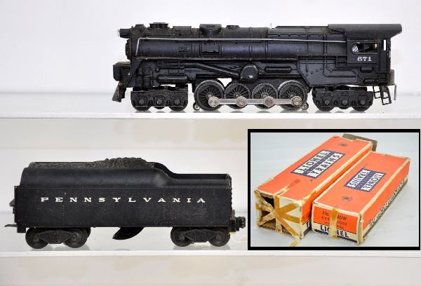 Boxed Lionel 681RR Steam Turbine: 1952 only production 671 turbine with iron drivers; 2046-50 PRR tender. Both have worn boxes and show moderate playwear, C6