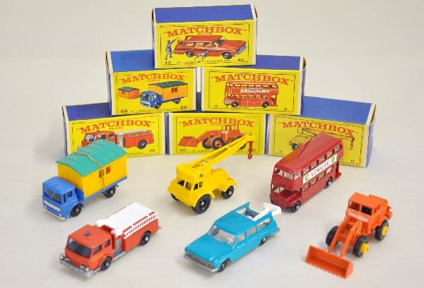 6 Boxed 1960s Matchbox Vehicles: Includes 5 bus; 60 site office; 69 front loader; 29 Denver fire truck; 11 crane & 42 Studebaker with hunter & dog. All have black plastic wheels & appear like new with crisp boxes, C9