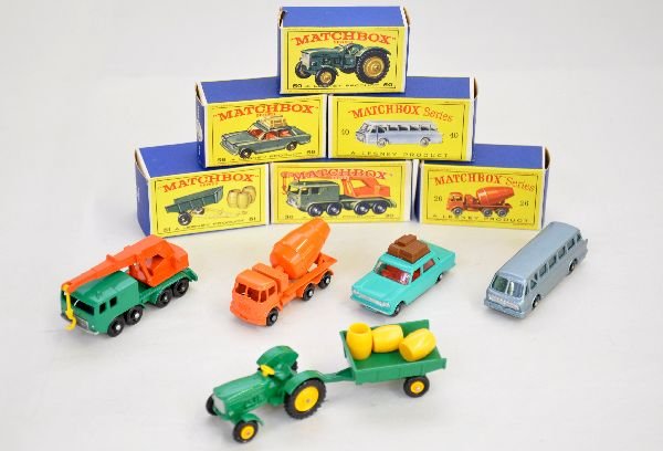 6 Boxed 1960s Matchbox Vehicles: Includes 40 bus; 26 cement mixer; 56 Fiat; 30 mobile crane; 50 tractor; 51 trailer with barrels. All appear like new with crisp boxes, C9