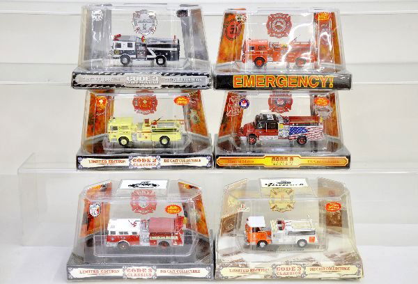 6 Mint Code 3 Fire Trucks: Includes 12113, 12371, 12216, 12393, 12391 & 12228. All are mint in box with sleeves, C10