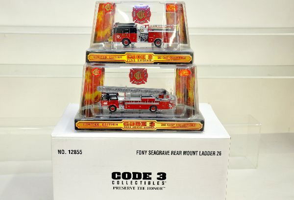 3 Mint Code 3 Fire Trucks, 1 Set: Includes 12392; 12495 with worn sleeve & a sealed FDNY 3pc rear mount ladder set. All are new in boxes, C10