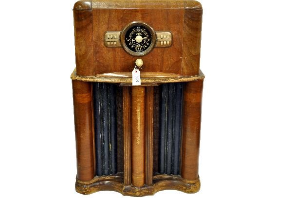 Zenith 1930s Short Wave Console Radio: Model 117, 28X17X43", waterfall design mahogany veneer case shows wear, tube type with ivory plascon buttons & dial bezel. Clocks, radios and other electrical devices are being sold as untested, as-is
