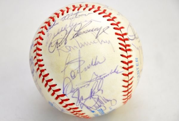 Team Signed All-star Yankees Baseball: From the Lawler collection comes this Rawlings game ball with 32 signatures including Yogi Berra, Rich Gossage; Willie Randolph; Griffey Sr, Clyde King; Ron Guidry 70; Dave Winfield; Bert Campaneris a
