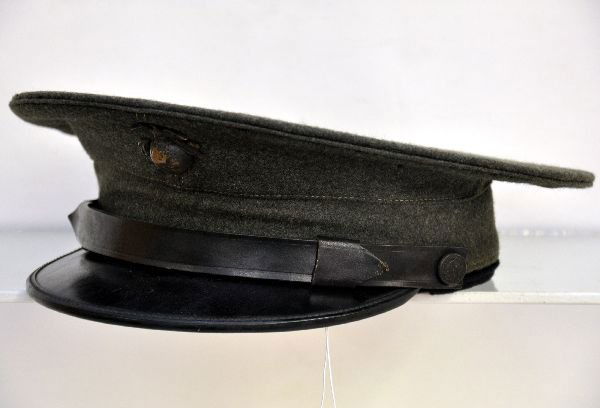 US Navy Cap: Wool dress cap with metal eagle over globe insignia on front, clean inside with vintage newspaper still inserted to tighten size. Clean. Examine photos or call for more information, 203 730-1404