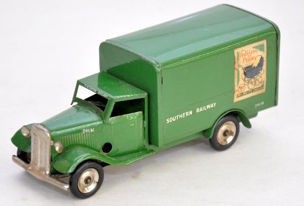 Scarce Tri-Ang Minic Southern RRY Van: Nice example of this scarce toy. It is clean and functional without a key. Its tires are round and has nice decals all around. The billboard stickers include Minic Motors one side & Pedigree Prams the
