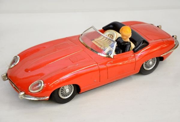 Large Tomiaya Tin Jaguar XKE: 12" litho tin with vinyl driver. It has very nice detailing, is clean & shiny and shows light playwear, C8-8+